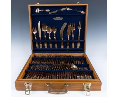 Original Siam set of cutlery featuring a raised Buddha at the end of handle set on rosewood. Sticker inside box: Jewelers Lin