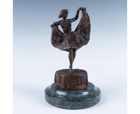 Beautiful cast bronze female exotic dancer with a hinged skirt that can be lifted to reveal a nude lower half. Marked Nam Gre