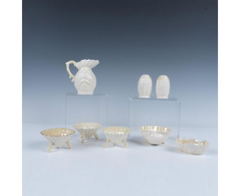 Darling collection of sea shell shaped dishes that consists of a creamer jug, two open salt cellars without a gilt border and