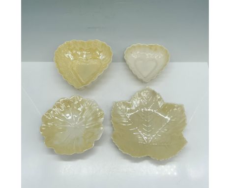 Adorable collection of plates that consists of a sycamore shaped dish, a flower petal shaped dish, a medium heart shaped dish