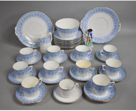 An Edwardian Transfer Printed Tea Set Decorated with Blue Floral Bute Pattern to comprise Ten Cups, Slop Bowl, Eleven Side Pl