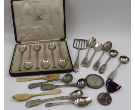 Mappin &amp; Webb, A cased set of six silver nail top coffee spoons, Sheffield 1919, together with; a silver asparagus server