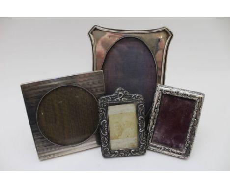 A.J. Pepper &amp; Co. Ltd. A silver mounted easel photograph frame, engine turned decoration, circular glazed display 7cm in 