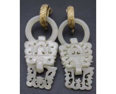 A pair of mutton fat jade wedding basket Devil's work earrings, having brass screw fittings, the jade portion hangs 4.5cm