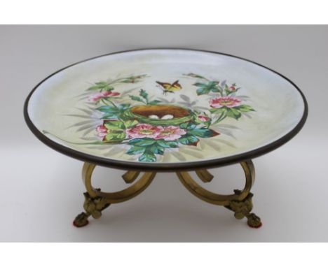 A late 19th century French tazza, the hand painted ceramic top, decorated with a nest, flowers &amp; butterfly, printed to th