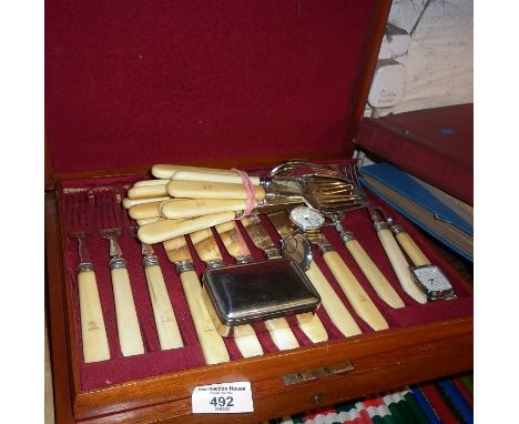 Cased set of fisheater cutlery, Timex watch heads, etc.