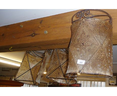 Three Middle Eastern wrought iron and decorated vellum wall light shades
