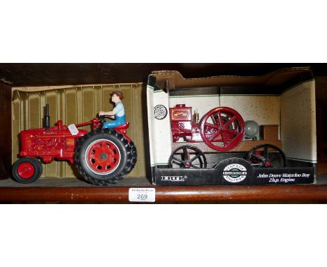 Ertl diecast Farmall tractor and driver, very good condition, and an Ertl John Deere Waterloo Boy 2hp engine in original box
