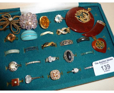 Jewellery case of rings, some silver, also including two Chinese jade type pendants