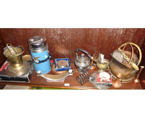 Silver plated ice bucket, American Eagle brand vacuum bottle and a shelf of other metalware