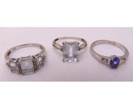 Two 9ct white gold aquamarine and diamond rings and a 9ct white gold sapphire and diamond ring, approx total weight 5.6g