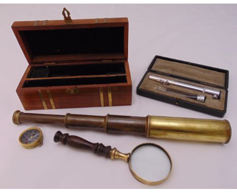 Chas F. Thackery cased medical instrument and a cased brass telescope, magnifying glass and a compass