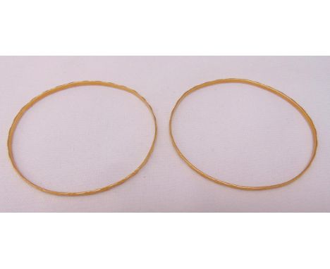 A pair of 18ct yellow gold bangles, approx total weight 11.4g