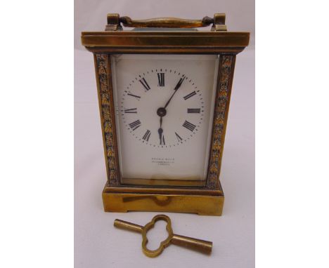 Drew and Sons of Leadenhall London brass carriage clock, white enamel dial with Roman numerals to include key