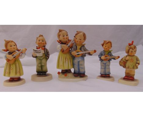 Five Hummel figurines of children in various poses some playing musical instruments, marks to the bases, tallest 13cm (h)