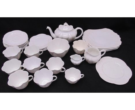 A Shelley white porcelain tea set to include a teapot, milk and cream jugs, bowls, plates, cups and saucers (33)