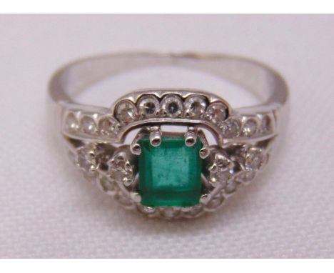White gold, emerald and diamond cocktail ring, gold tested 18ct, approx total weight 3.9g