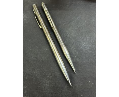 2 Silver propelling pencils 