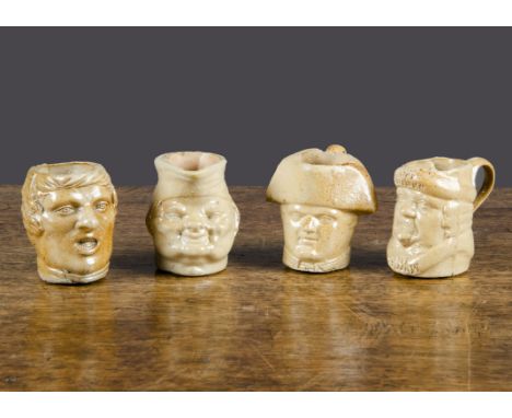 Four miniature salt-glazed stoneware character jugs,  a ‘Before and After Marriage’ reversible portrait mug with happy and sa