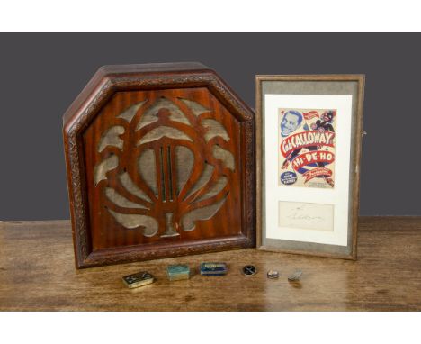 A Celestion Radio Co wooden wireless speaker,  with fretwork front —14in. (35.5cm.) high; a Cab Calloway signature, framed, w