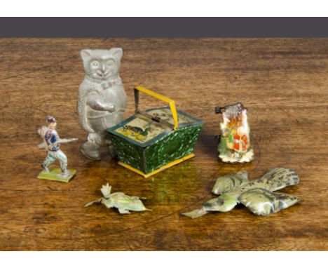 Small tinplate novelties, a Penny Toy hamper with duck and chicken on hinged lids —2¾in. (7cm.) long; a tinplate pigeon holdi