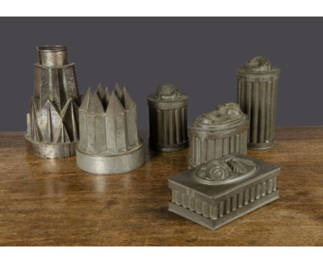 Six British tinplate moulds,  two architectural jelly moulds —8½in. (21.5cm.) largest; ice cream or confectionery box-type mo