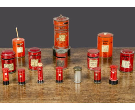 Toy and saving bank post boxes, a Bryant &amp; May VR match holder and calendar —4¾in. (12cm.) high; and two smaller examples