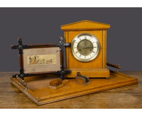 An oak mantel clock,  with inlay banding —12½in. (32cm.) high; an oak tray; a pen wipe; a framed Stevengraph 'The Good Old Da