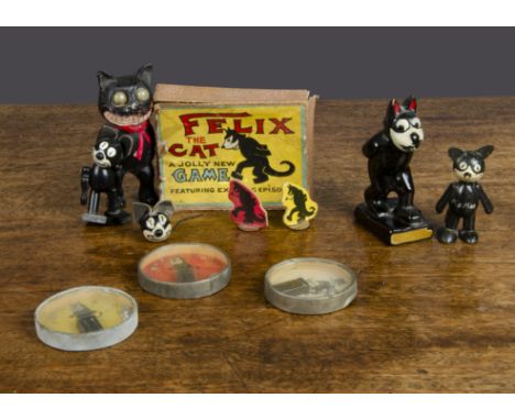 Various Felix the Cat toys, three dexterity games; two wooden Felix the Cat, probably Italian; a glass Felix; a M.I.P. Felix 