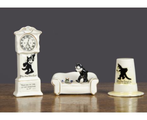 Three pieces of Felix the Cat crested china, a Carlton China sofa with Felix walking on the seat and crest from Brighton —3¾i