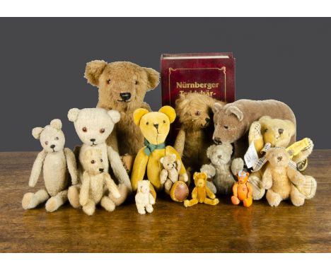 Collector’s teddy bears,  four small old style jointed teddy bears;  a Steiff limited edition bear on wheels; a Schuco limite