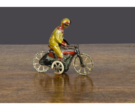 A small Kellermann early motorcycle and rider,  fly-wheel driven, lithographed khaki rider with detailed chain driven engine 