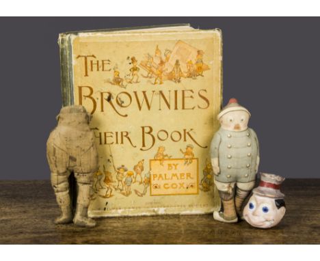 The Brownies Their Book by Palmer Cox, two printed cloth dolls (one very discoloured) and a composition puppet or doll’s head