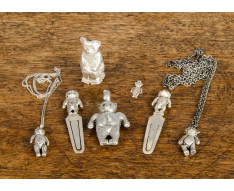 Silver teddy bear itens, two English hallmarked silver teddy bear book marks —2¼in. (6cm.) high (missing eyes); two articulat