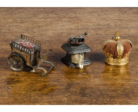 Two tape measures,  a gilt-metal horseless carriage automobile —2½in. (6.5cm.) long (missing front wheels and one tyre); and 