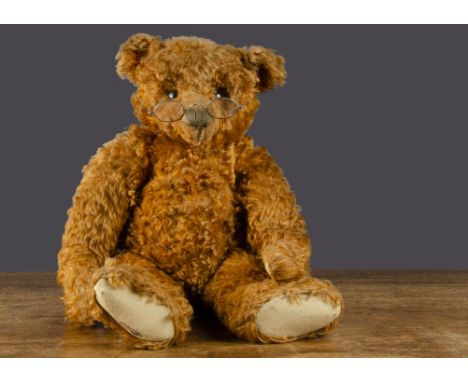 Importnat announcment - please note there is a slight tear to this bear's right foot pad as shown in photograph.A rare early 