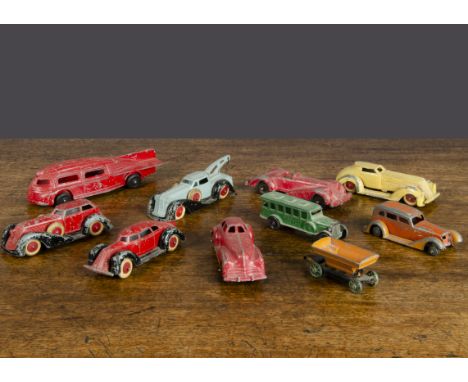 American Diecast vehicles,  Manoil - five streamlined Art Deco-style automobiles, a similar breakdown truck and airship shape