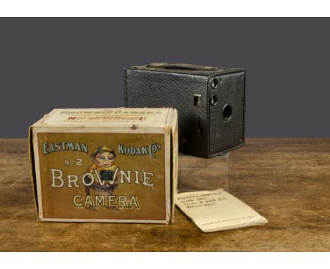 An Eastman Kodak Co Brownie Camera No 2,  with instructions, in original box illustrated with a Brownie —5¾in. (14.5cm.) long