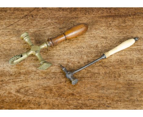 A 19th Century ice or crafting hammer, with bone handle and steel head with spike and textured flat head —7in. (18cm.) long; 