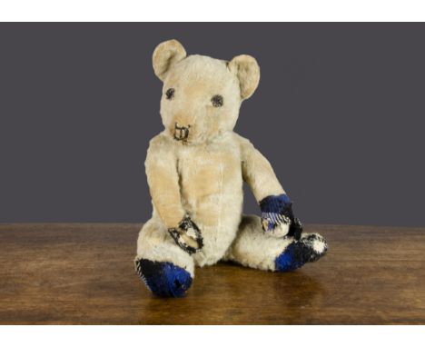 A Chiltern Cubby teddy bear 1930s,  with pale blue wool plush, remains of black stitched nose and mouth, swivel head, jointed