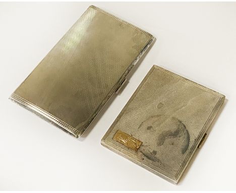 2 ENGINE TURNED CIGARETTE BOXES ONE HAS 9CT GOLD INSIGNIA - 352. GRAMS APPROX