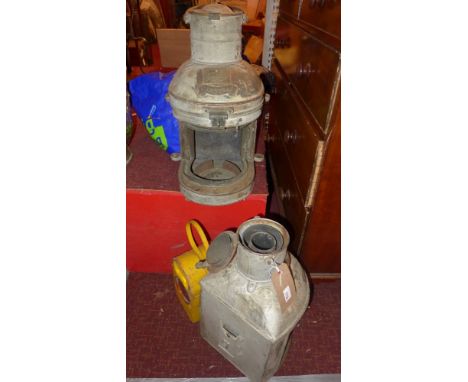 An Antique 'port' ships light together with a similar (missing the glass) marked 'Davey's improved regulation ship lamp, Mast
