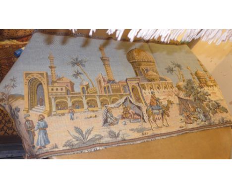 A tapestry depicting an Arabic scene