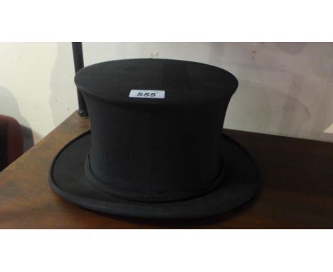 A vintage collapsible top hat 