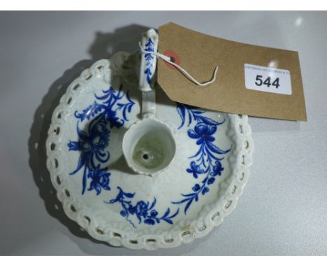 An Antique Worcester porcelain chamberstick with blue floral designs 
