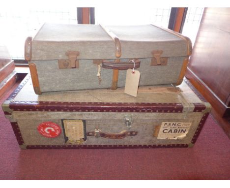 A vintage carved cabin trunk and another 