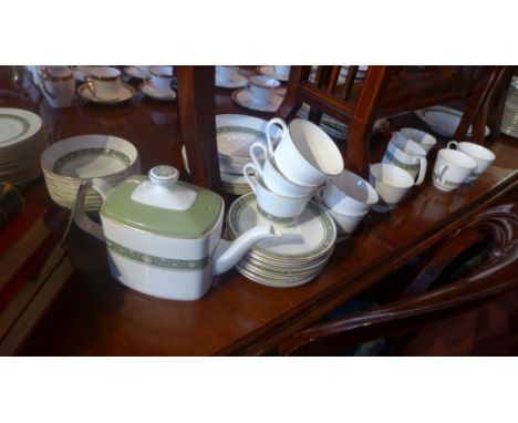 A Royal Doulton part Rondelay pattern dinner set including teapot, cups and saucers, plates and bowls 