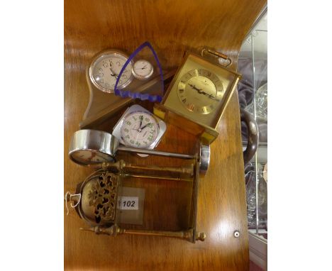 A brass Lantern clock for restoration together with a carriage clock and other clocks