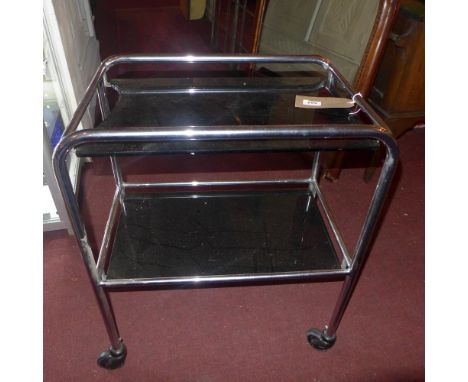 A vintage tubular Dentist's trolley with dark glass inserts (one broken) with G + R Label 