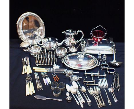 A QUANTITY OF SILVER-PLATED WAREincluding a tea service, ladle, toast rack cranberry lined basket, entree dish and other item